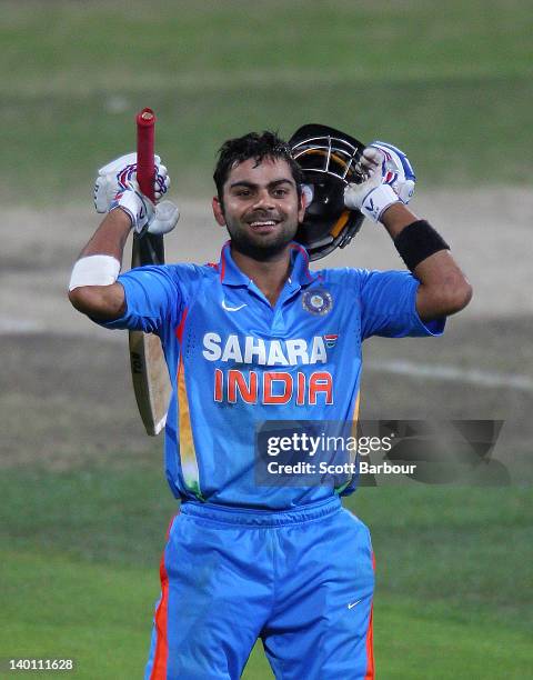 Virat Kohli of India celebrates after reaching his century during the One Day International match between India and Sri Lanka at Bellerive Oval on...