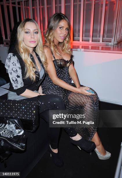 Karina Cascella and Guendalina Canessa attend the Philipp Plein fashion show as part of Milan Womenswear Fashion Week on February 25, 2012 in Milan,...
