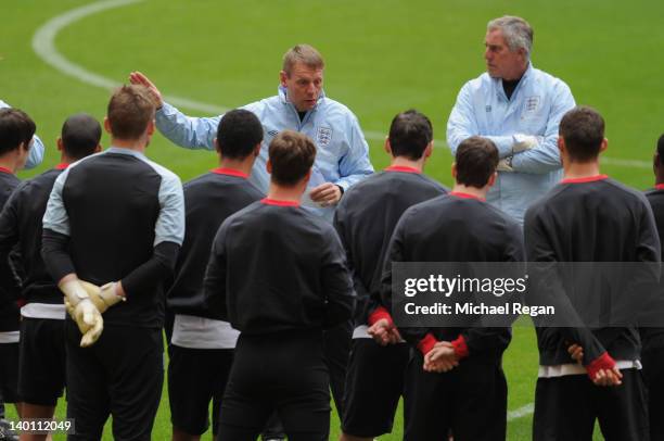 England manager Stuart Pearce talks to the squad during the England Training and Press Conference at Wembley Stadium on February 28, 2012 in London,...