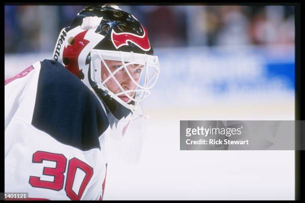 Goaltender Martin Brodeur of the New Jersey Devils looks on during a game against the Philadelphia Flyers at the Continental Airlines Arena in East...