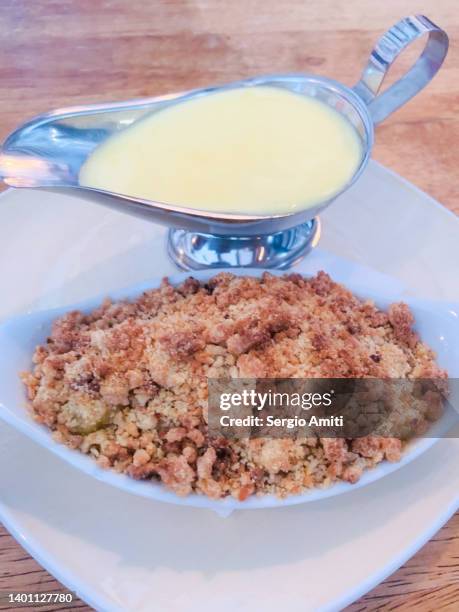 apple crumble with custard - jug of custard stock pictures, royalty-free photos & images