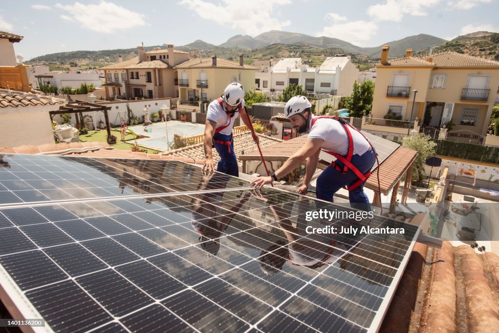 Installation of solar panels on the roof of a house, Installation of solar panels on the roof of a house, maintenance and cleaning with vertical works