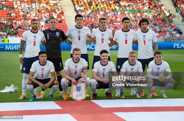 The England team group, back row l-r, Kyle Walker, Jordan Pickford, Harry Maguire, Conor Coady, Jude Bellingham, Trent Alexander-Arnold, front row...