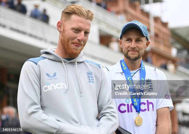 Man of the Match Joe Root of England shares a joke with England captain Ben Stokes after day four of the First LV= Insurance Test match between...