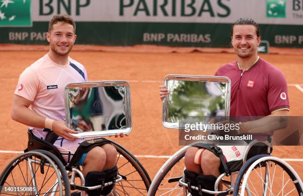 Alfie Hewett of Great Britain and partner Gordon Reid of Great Britain celebrate with the trophy after winning against Gustavo Fernandez of Argentina...