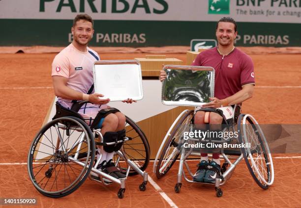 Alfie Hewett of Great Britain and partner Gordon Reid of Great Britain celebrate with the trophy after winning against Gustavo Fernandez of Argentina...