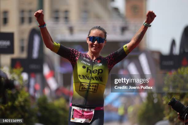 Laura Philipp of Germany celebrates after winning the IRONMAN Hamburg on June 05, 2022 in Hamburg, Germany.