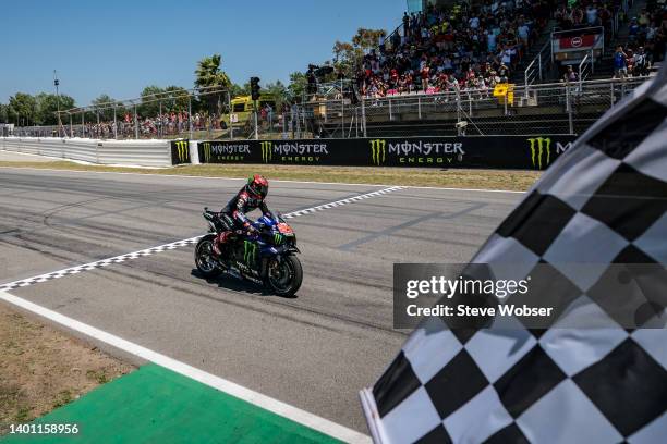 Fabio Quartararo of France and Monster Energy Yamaha MotoGP crosses the finish line and wins the race during the race of the MotoGP Gran Premi...