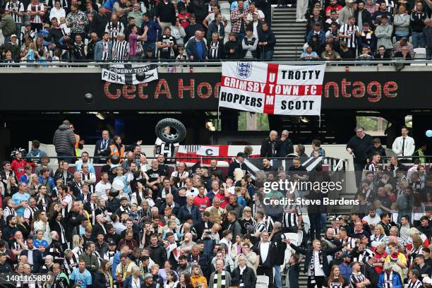 Grimsby Town fans show their support prior to the Vanarama National League Final match between Solihull Moors and Grimsby Town at London Stadium on...