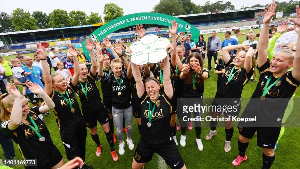 The team of Meppen cdelebrates with the champions trophy on the podium afterw winning 3-1 the 2. Frauen-Bundesliga match between SV Meppen and...