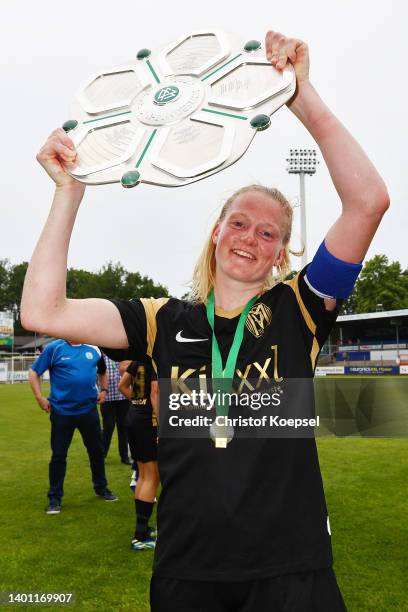 Sarah Schulte of Meppen lifst the champions trophy after winning 3-1 the 2. Frauen-Bundesliga match between SV Meppen and Borussia Bocholt at...