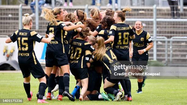 The team of Meppen celebrates after winning the champions trophy after the 2. Frauen-Bundesliga match between SV Meppen and Borussia Bocholt at...