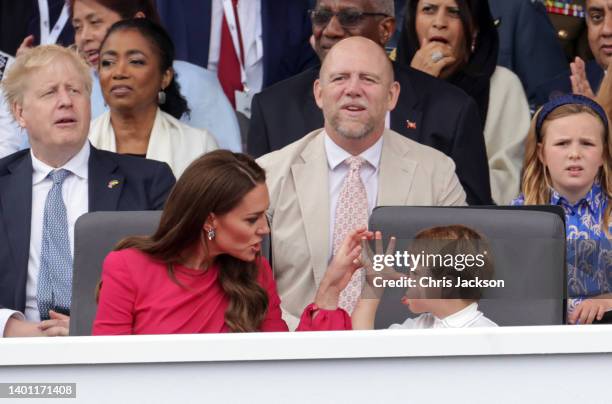 Prime Minister Boris Johnson, Mike Tindall, Mia Tindall Catherine, Duchess of Cornwall and Prince Louis of Cambridge watch the Platinum Pageant on...