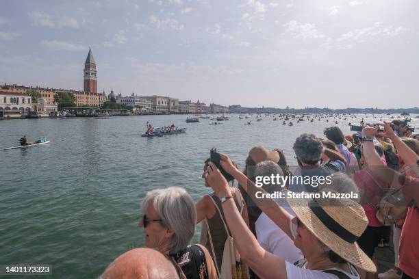 Locals and tourists watch the start of the regatta on June 05, 2022 in Venice, Italy. This year marks the 46th edition of the non-competitive...