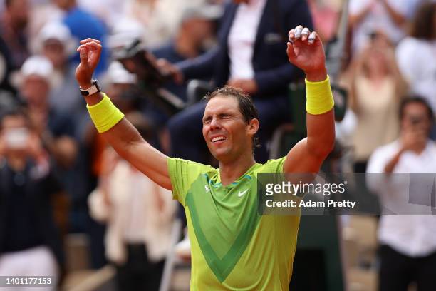 Rafael Nadal of Spain celebrates after winning match point against Casper Ruud of Norway during the Men's Singles Final match on Day 15 of The 2022...