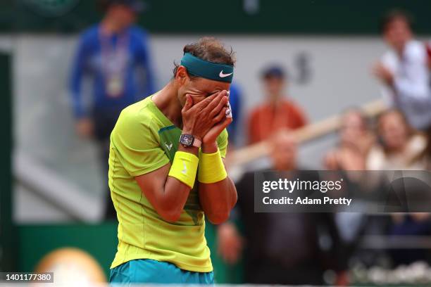 Rafael Nadal of Spain celebrates after winning match point against Casper Ruud of Norway during the Men's Singles Final match on Day 15 of The 2022...