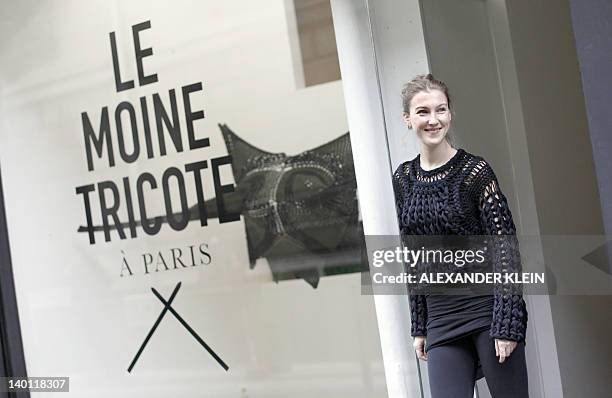 French designer Alice Lemoine poses outside Le Moine Tricote a Paris store during the presentation of her Fall/Winter 2012-2013 ready-to-wear...