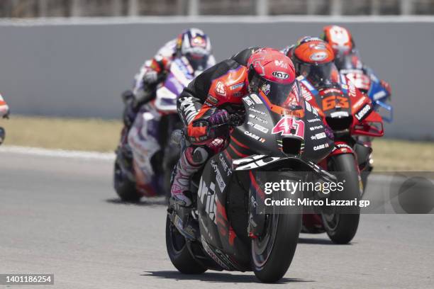 Aleix Espargaro of Spain and Aprilia Racing leads the field during the MotoGP race during the MotoGP of Catalunya - Race at Circuit de...