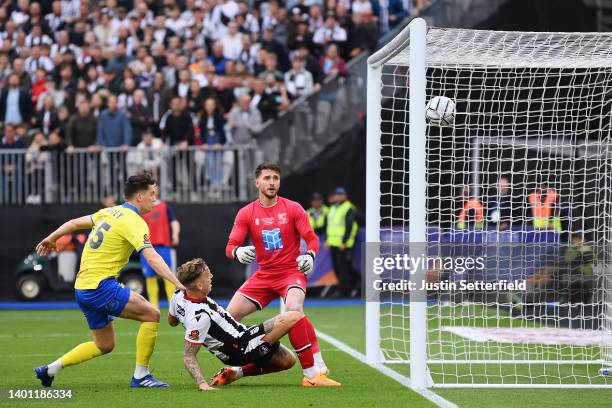 Jordan Maguire-Drew of Grimsby Town scores their team's second goal during the Vanarama National League Final match between Solihull Moors and...