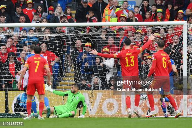 Heorgiy Bushchan reacts as Andriy Yarmolenko of Ukraine scored an own goal during the FIFA World Cup Qualifier between Wales and Ukraine at Cardiff...