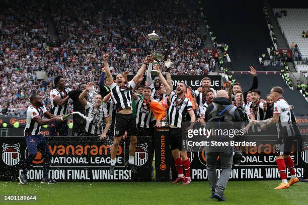 Giles Coke and Luke Waterfall of Grimsby Town lift the Vanarama National League Final trophy after their sides victory during the Vanarama National...