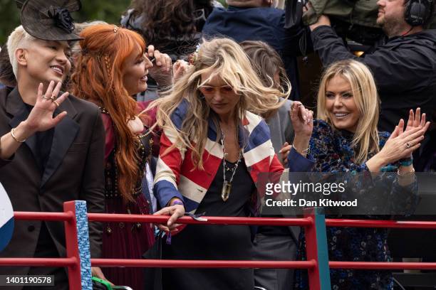 Charlotte Tilbury, Kate Moss and Patsy Kensit ride a bus along the mall during the Platinum Pageant on June 05, 2022 in London, England. The Platinum...