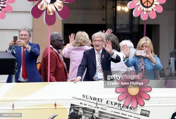 Alan Titchmarsh, William Roache and Kate Garraway wave during the Platinum Pageant on June 05, 2022 in London, England. The Platinum Jubilee of...