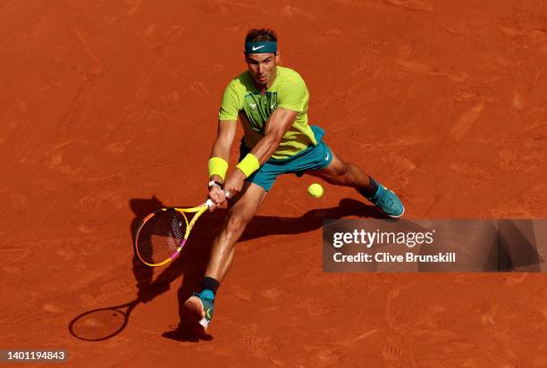 Rafael Nadal of Spain plays a backhand against Casper Ruud of Norway during the Men's Singles Final match on Day 15 of The 2022 French Open at Roland...