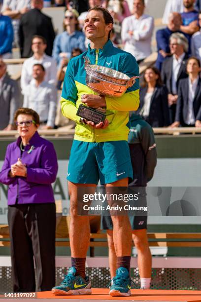 Rafael Nadal of Spain poses with the Musketeers’ Cup after winning Championship point against Casper Ruud of Norway during the Men's Singles Final...