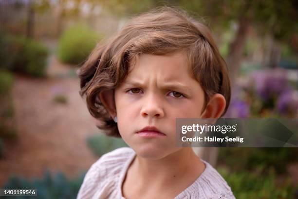 grumpy and upset - sneering stock pictures, royalty-free photos & images