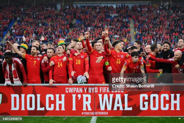 Joe Allen, Connor Roberts, Aaron Ramsey, Gareth Bale, Ethan Ampadu and Neco Williams of Wales celebrate after their sides victory, which qualifies...