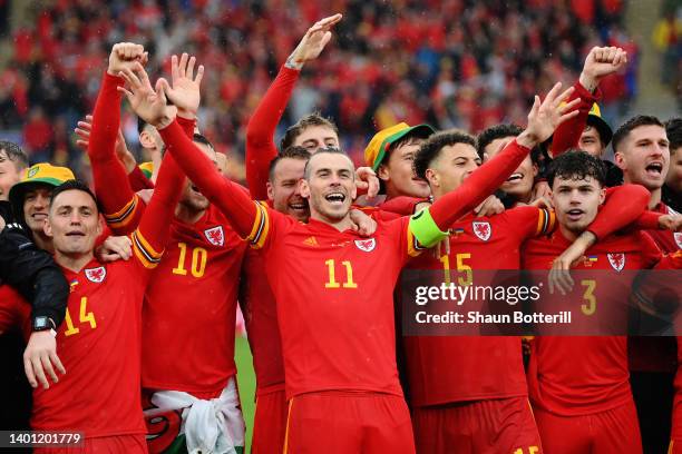 Gareth Bale of Wales celebrates with teammates after their sides victory, which qualifies Wales for the 2022 FIFA World Cup during the FIFA World Cup...