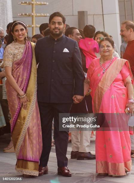 Shloka Mehta Ambani, Akash Ambani and Kokilaben Ambani attend the Arangnetram ceremony of Ms. Radhika Merchant on June 05, 2022 in Mumbai, India