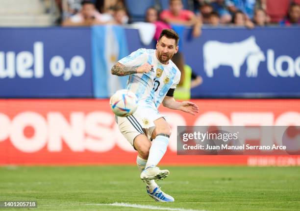 Lionel Messi of Argentina scoring his team's second goal uring the international friendly match between Argentina and Estonia at Estadio El Sadar on...