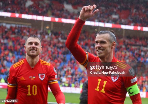 Gareth Bale Captain of Wales with team-mate Aaron Ramsey celebrates after beating Ukraine 1-0 in the FIFA World Cup Final Play-Off at Cardiff City...