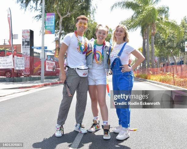 Ezra Sosa, JoJo Siwa, and Mollee Gray pose for portrait at The City Of West Hollywood's Pride Parade on June 05, 2022 in West Hollywood, California.