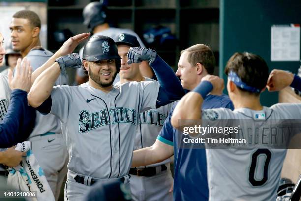 Eugenio Suarez of the Seattle Mariners celebrates a home run against the Texas Rangers in the fourth inning at Globe Life Field on June 05, 2022 in...