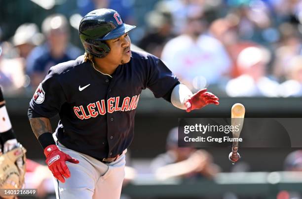 Jose Ramirez of the Cleveland Guardians tosses his bat after a pop out in the eighth inning against the Baltimore Orioles at Oriole Park at Camden...