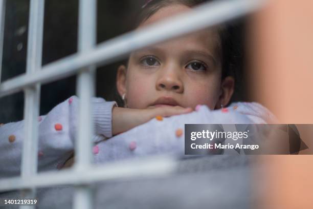 close up portrait of latina sad little girl - orphanage stock pictures, royalty-free photos & images