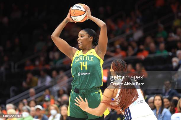 Jantel Lavender of the Seattle Storm handles the ball against Satou Sabally of the Dallas Wings during the first quarter at Climate Pledge Arena on...