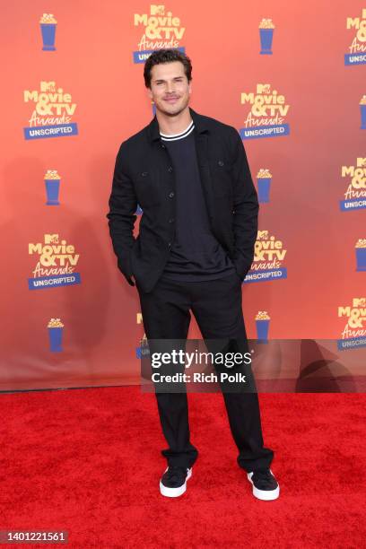 In this image released on June 5, Gleb Savchenko attends the 2022 MTV Movie & TV Awards: UNSCRIPTED at Barker Hangar in Santa Monica, California and...