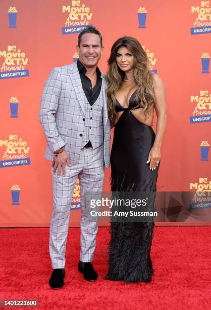 In this image released on June 5, Louie Ruelas and Teresa Giudice attend the 2022 MTV Movie & TV Awards: UNSCRIPTED at Barker Hangar in Santa Monica,...