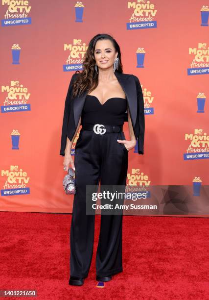 In this image released on June 5, Kyle Richards attends the 2022 MTV Movie & TV Awards: UNSCRIPTED at Barker Hangar in Santa Monica, California and...