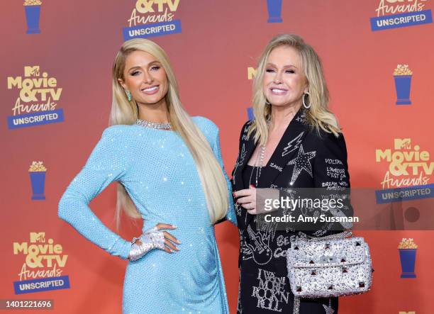 In this image released on June 5, Paris Hilton and Kathy Hilton attend the 2022 MTV Movie & TV Awards: UNSCRIPTED at Barker Hangar in Santa Monica,...