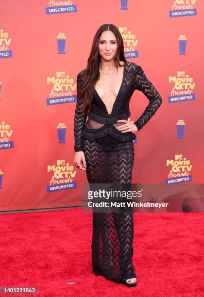 In this image released on June 5, Tefi Pessoa attends the 2022 MTV Movie & TV Awards: UNSCRIPTED at Barker Hangar in Santa Monica, California and...