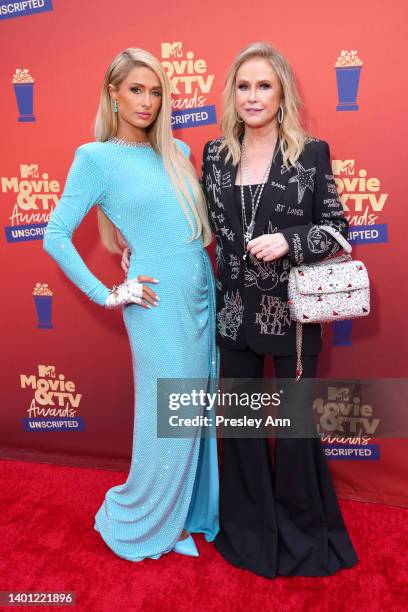 In this image released on June 5, Paris Hilton and Kathy Hilton attend the 2022 MTV Movie & TV Awards: UNSCRIPTED at Barker Hangar in Santa Monica,...