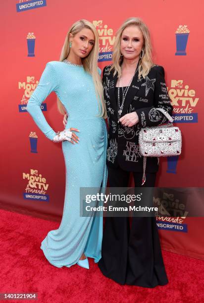 In this image released on June 5, Paris Hilton and Kathy Hilton attend the 2022 MTV Movie & TV Awards: UNSCRIPTED at Barker Hangar in Santa Monica,...