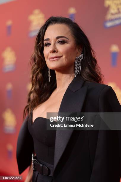 In this image released on June 5, Kyle Richards attends the 2022 MTV Movie & TV Awards: UNSCRIPTED at Barker Hangar in Santa Monica, California and...