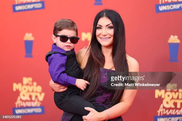 In this image released on June 5, Christopher John Buckner and Deena Nicole Cortese attend the 2022 MTV Movie & TV Awards: UNSCRIPTED at Barker...