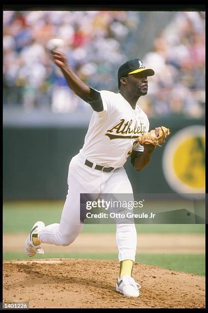 Pitcher Dave Stewart of the Oakland Athletics prepares to throw the ball. Mandatory Credit: Otto Greule /Allsport